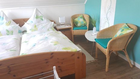 Ferienzimmer mit Sitzgelegenheit | © Hedi Sommers Ferienzimmer mit Sitzgelegenheit | © Hedi Sommers